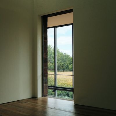 A calm, empty studio space with natural light.